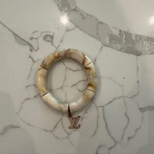 Bracelet with LV charm